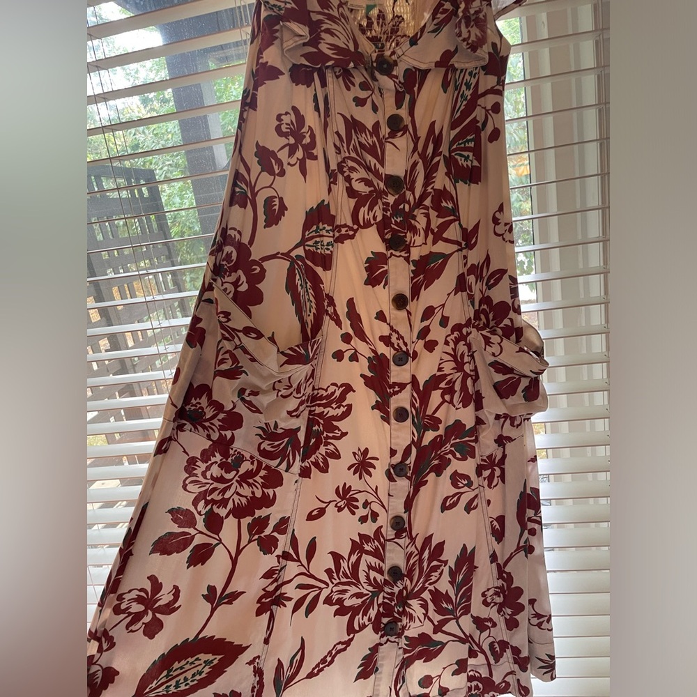 Beautiful cream and rust midi dress that flares at waist